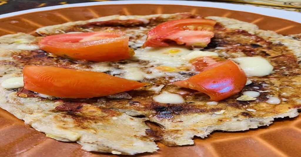 DRAMATURGIA, DIETAS Y PIZZAS 10 En la foto se ve una especie de pizza hecha con plátanos y tomates