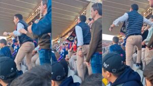 En la foto, aficionados ofenden a Vinicius en la grande de Montjuic