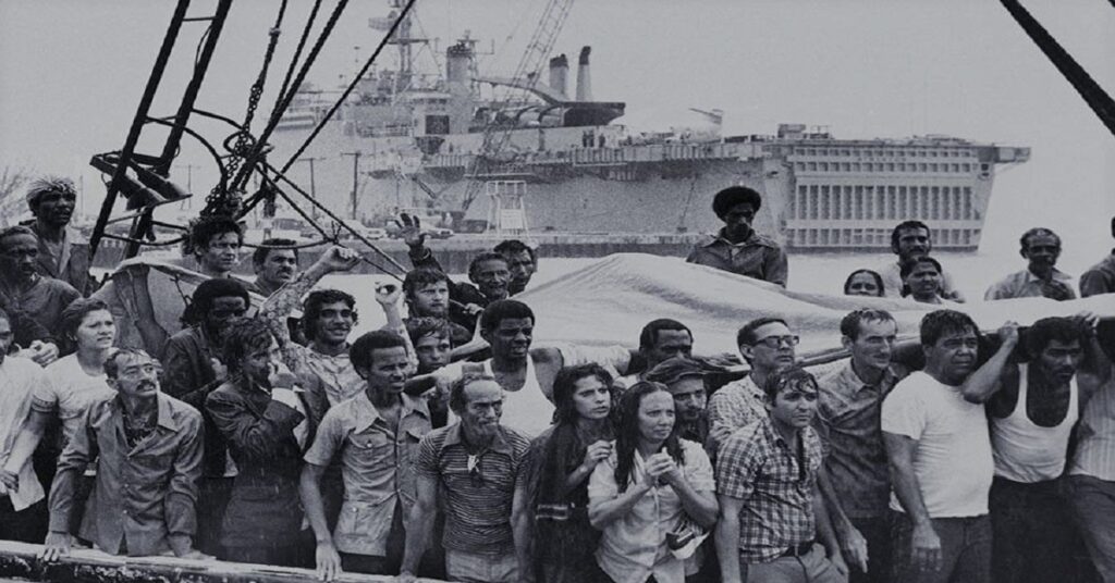 En la foto, cubanos que salieron por El Mariel