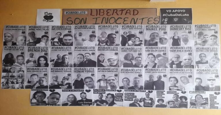 En la foto, un mural con presos políticos cubanos