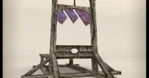 En la foto, una guillotina con el logo de Etecsa como cuchilla