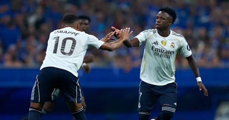 En la foto, Viny Jr. y Mbappé