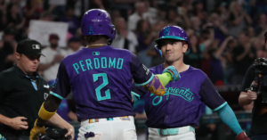 En la foto, Corbin Carroll y Perdomo