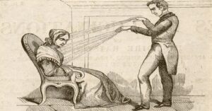 En la foto, Grabado en madera de un msmerista trabajando