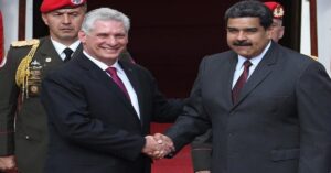 En la foto, Díaz-Cane y Nicolás maduro