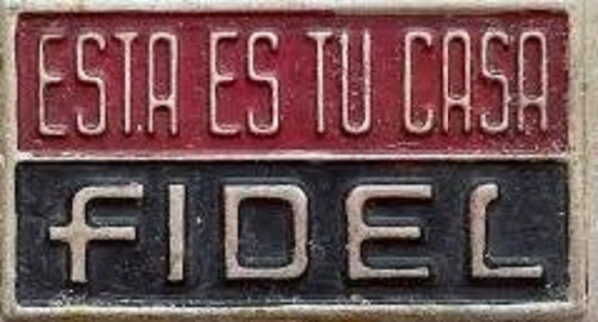 En la foto, un letrero que dice: Esta es tu casa Fidel