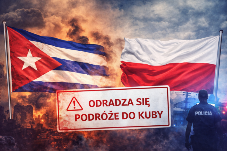Banderas de Cuba y Polonia junto a una señal de advertencia de viaje que desaconseja viajar a Cuba debido a la crisis energética, social y de seguridad en la isla.