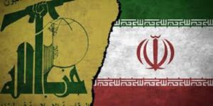 En la foto, las banderas de Hezbolá e Irán