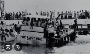 En la foto, cubanos dejan el país por el Mariel