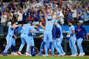 En la foto, Rangers celebra el triunfo ante Astros