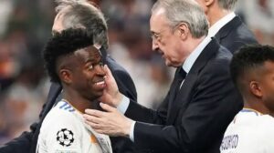 En la foto, Viny Jr. y Florentino Pérez