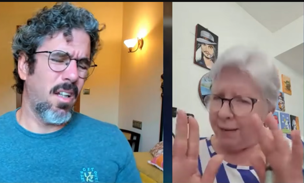 En la foto, Luis Dener y la señora del vídeo que defiende al castrismo desde EEUU