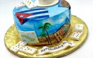 En la foto, un pastel con una bandera cubana