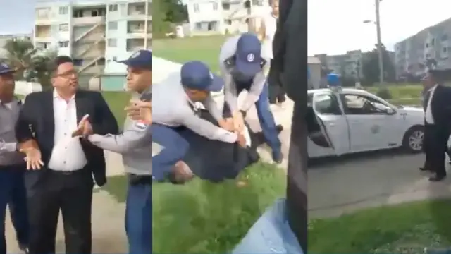 En la foto, esbirros del castrismo detienen al pastor Rolando